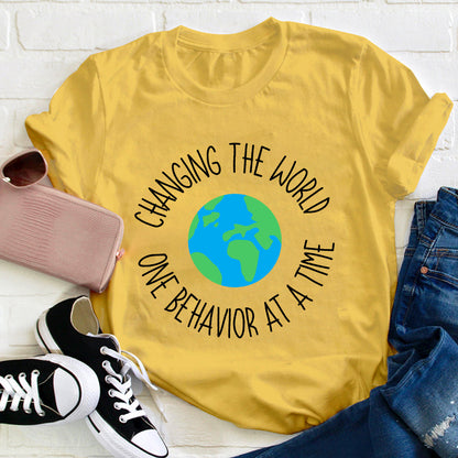 Changing The World One Behavior At A Time Teacher T-Shirt