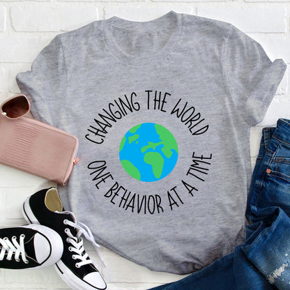 Changing The World One Behavior At A Time Teacher T-Shirt